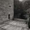 View of lade and sluice from W