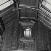 Detail of wall panelling above the West bay-windowed alcove in the music room.