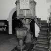 Interior. View of pulpit and font
