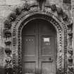 Detail of arched door surround.