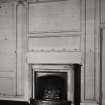 Interior.
Detail of fireplace and panelling in library.