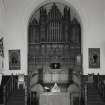 Interior. View of platform area from SE showing organ, pulpit and communion table