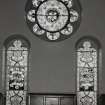 Interior. Detail of transept stained glass windows