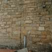 Detail of blocked opening in W end of N wall.