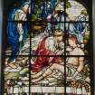 Detail of stained glass window at E end.