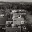 Oblique aerial view from SW.