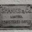 Detail of name plaque at main office.