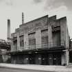 View of electricity transformer house from W.