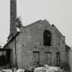 Steading, boilerhouse and chimney, view from NW