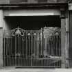Detail of decorative gate leading to pend in S bay.