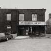 View from S of entrance to Burnthills Group Offices, at S end of four- storeyed mill ( W mill).  Photosurvey 22-APR-1992