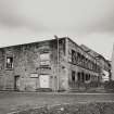 View from SW of roofless multi-storeyed mill building and NW corner of works.  Photosurvey 22-APR-1992