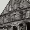 Detail of gable at E end of multi-storeyed  mill at N end of works, also showing cast-iron bearing boxes and wall tie-plates Photosurvey 22-APR-1992