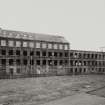 General view from N of multi-storeyed mill at NW corner of works Photosurvey 22-APR-1992