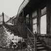 Detail of ornate iron stair and balcony leading to upper floor on E side of building fronting High Street Photosurvey 22-APR-1992