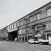 Oblique view from north west of central portion of main facade overlooking Old Sneddon Street