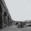 Paisley, Gilmour Street, Railway Station
Oblique view from east of masonry arches supporting the ramp leading up to the platform at the north west corner of the station