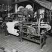 Carpet loom made by A F Craig Ltd of Paisley: general front view after loom had been moved to the Royal Museum of Scotland from Stoddard's factory in Elderslie.  Photosurvey APR-1990