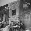 Interior view of Newhailes House showing the library including 
fireplace and overmantle.