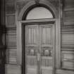 Interior.
View of door on N side of main Council Chamber.