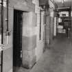 Interior.
View of a row of cells in the cell block.