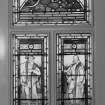 Interior. Ground floor, entrance hall, detail of stained glass in door