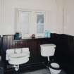 Interior. 1st level. Staff toilets showing period sanitary ware.