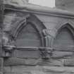 Detail of arcade carving on E gable.