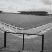 View of stands and terracing from NW.