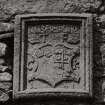 Detail of armorial panel built into stair tower.