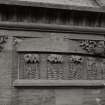 Detail of carving of birds and ferns on SW angle turret..