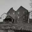 General view of mill from SSE, showing water wheel house.