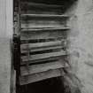 Detailed view of wooden buckets of the low-breast water wheel, 15 ft diameter.