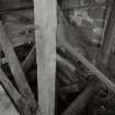 Detailed view of low-breast water wheel, 15 ft diameter, showing iron shaft and hubs, and wooden arms.