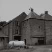 General view of mill from NE, prior to removal of building on E of mill.