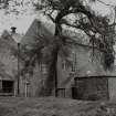 General view of mill from SE, prior to removal of building on E of mill.