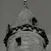 Detail of top of tower from W.