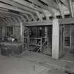 Interior. 2nd (top) floor of mill, general view from NE, with wooden grain silo visible to right