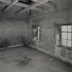 Interior. view from SSW of wire-mesh floor of the east drying kiln, the floor having been removed from the west kiln