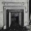 Interior.
View of fireplace at first floor of no 9.