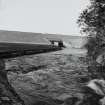 General view of dam and sluice outlet from SE