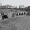 Oblique view from W, showing the entire SW side of the bridge