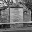 Detailed view of plaque at SE end of the bridge (N side)