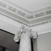 Interior.  Ground floor, inner hall, detail of opening to stairway showing Ionic column capital and plasterwork of entablature.