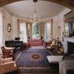 Interior.  Ground floor, living room, view from arched opening from library.