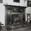 Interior.  Ground floor, dining room, detail of fireplace area.