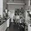 Interior.  Ground floor, view of N flank apartment in use as kitchen.