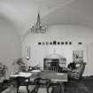 Interior.  Basement floor, view of vaulted chamber with replacement art nouveau fireplace.