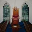 Interior.
View from N at gallery level showing pulpit.