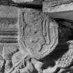 Strathmore aisle, detail of carved shield on column capital on north wall